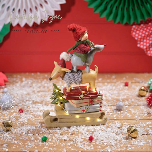 Child On Reindeer Ornament With Light Up Sleigh